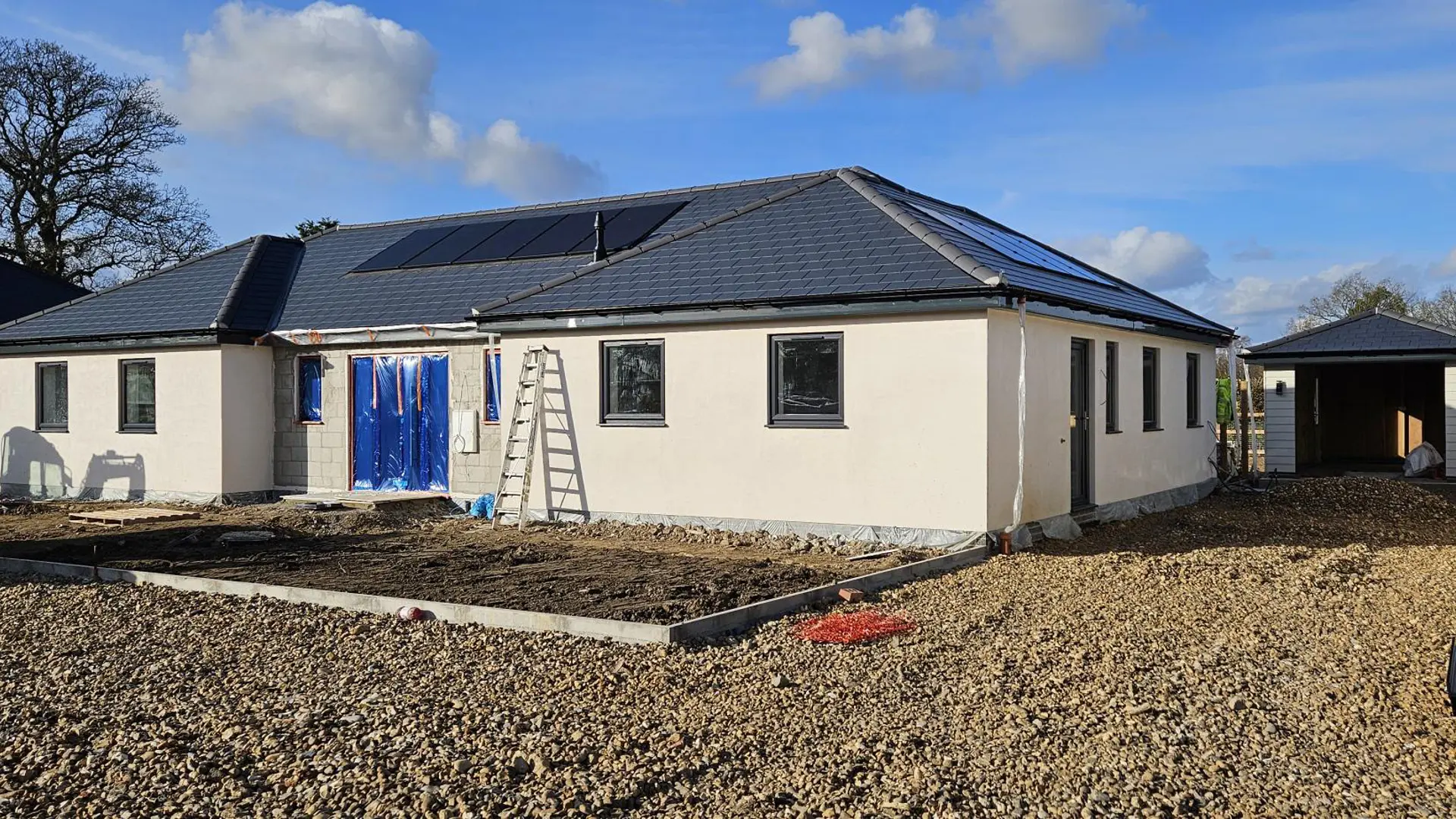 Silicone render to bungalows in Bentley 2